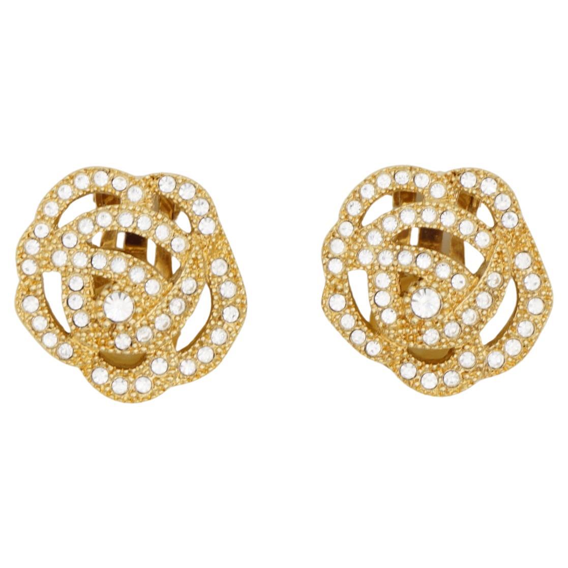 Christian Dior Vintage 1980s Openwork Rose Camellia Floral Whole Crystals Clip Earrings, Gold Plated

Very excellent condition. 100% Genuine.

A very beautiful pair of earrings by DIOR, signed at the back. Rare to find.

Size: 2.3*2.3 cm.

Weight: 8