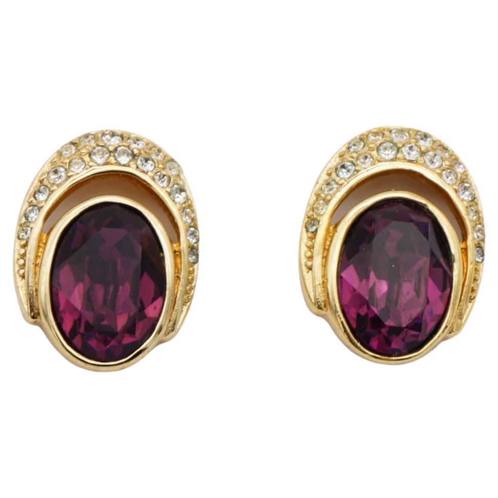 Christian Dior Vintage 1980s Oval Crystals Amethyst Purple Openwork Pierced Earrings, Gold Tone

Very good condition. Light scratches or colour loss, barely noticeable. Not original ears blocks. 100% Genuine.

A very beautiful pair of clip on