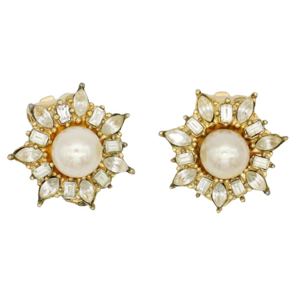 Christian Dior Vintage 1980s Radiant Flower Snowflake White Pearl Crystals Clip Earrings, Gold Plated

Very good condition. Some light scratches and colour loss, barely noticeable. 100% Genuine.

A very beautiful pair of earrings by Chr. DIOR,