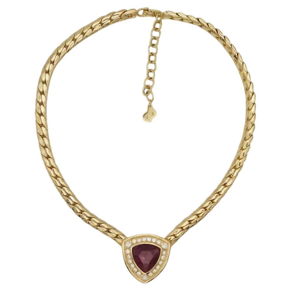 Christian Dior Vintage 1980s Ruby Red Diamond Triangle Crystals Pendant Elegant Modernist Necklace, Gold Plated

Very good condition. Not any colour loss except the clasp. 100% Genuine. 

Marked 'Chr.Dior (C) '. Rare to find.

Material: Gold plated