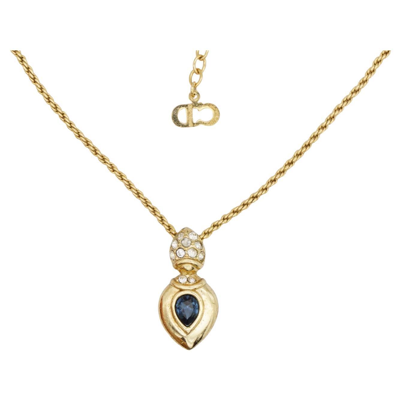 Christian Dior Vintage 1980s Sapphire Navy Blue Crystals Water Tear Drop Pendant Necklace, Gold Tone

Very good condition. Light scratches or colour loss, barely noticeable. 100% Genuine. 

Rare to find. Very beautiful. Marked 'Chr.Dior (C)