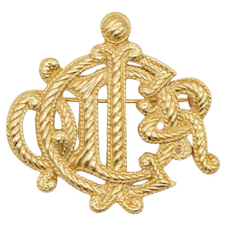 Christian Dior Vintage 1980s Textured Large Logo Monogram Rope Gold Brooch For Sale