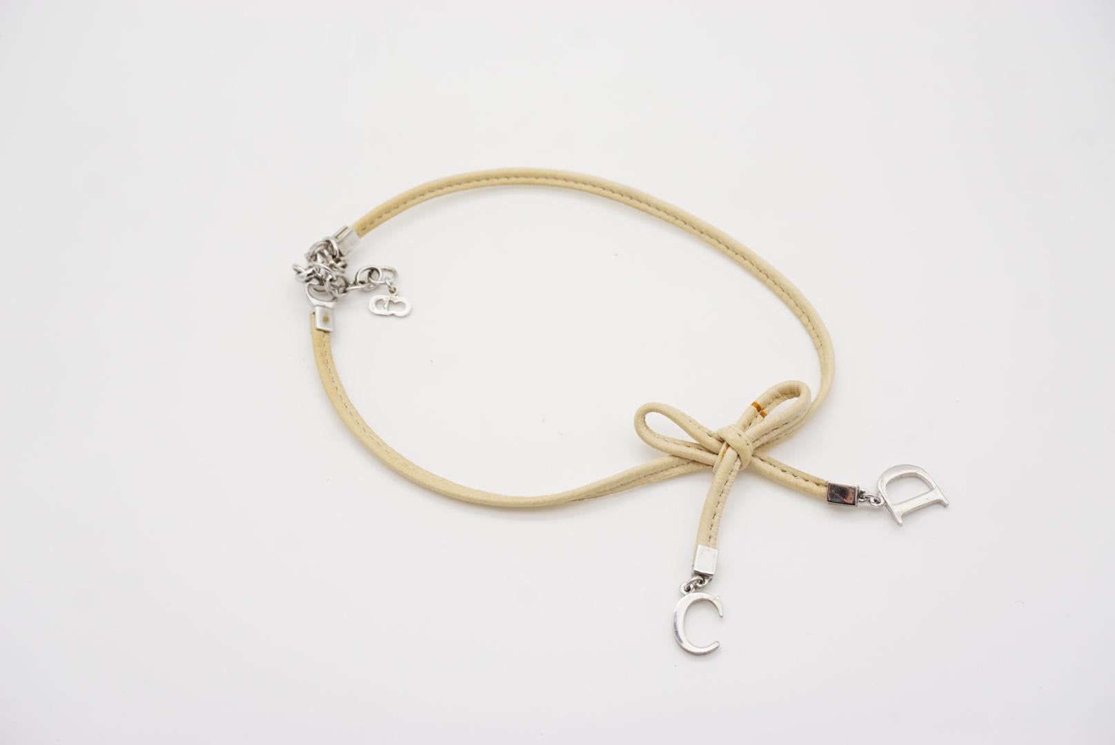 Christian Dior Vintage 1990 CD Logo Charm Bow Tie Beige Leather Choker Necklace For Sale 8