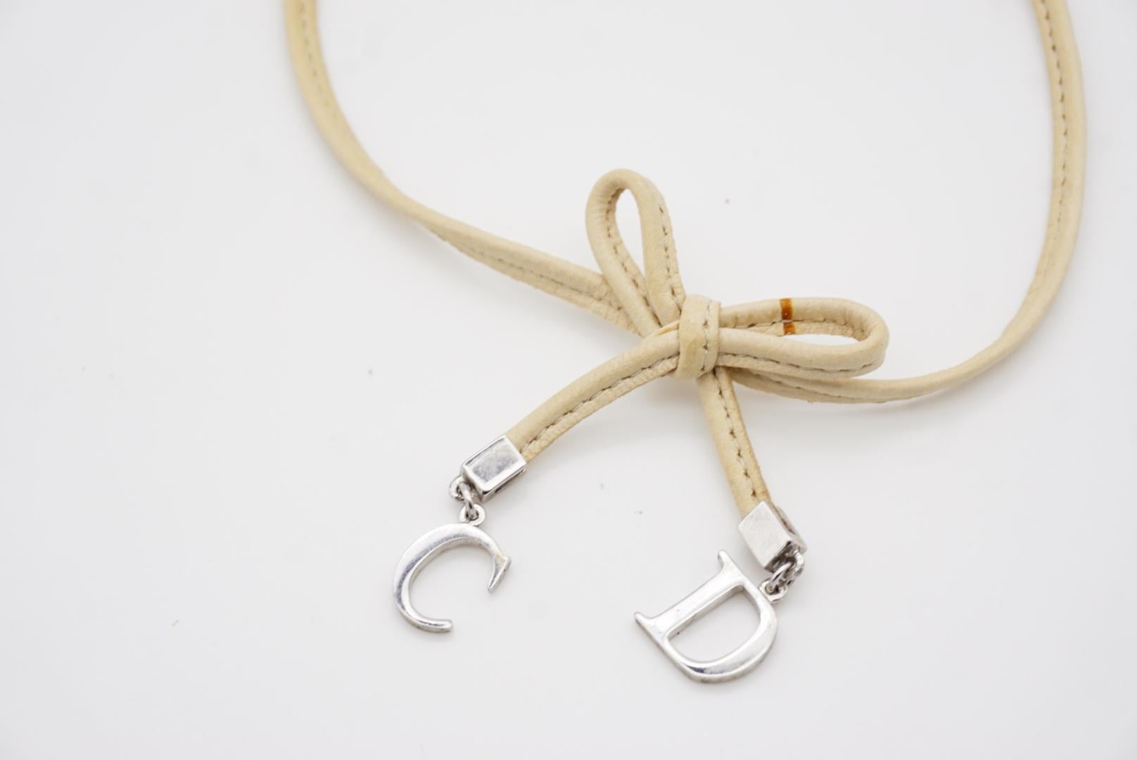 Christian Dior Vintage 1990 CD Logo Charm Bow Tie Beige Leather Choker Necklace For Sale 4