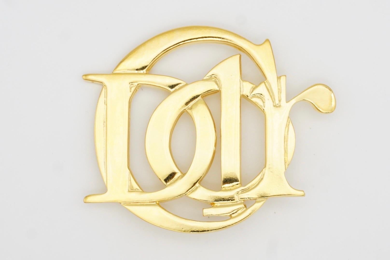 Christian Dior Vintage 1990s Large Glow Iconic Logo Monogram Letters Interlocked Brooch, Gold Tone

Very excellent condition. Very new. 100% genuine.

A unique piece. This is gold plated stylised brooch. Come with original bag. Signed at