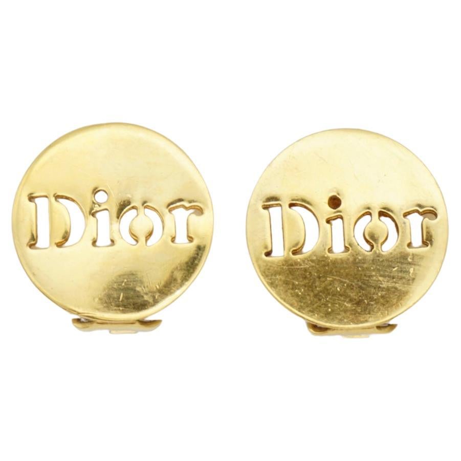 Christian Dior Vintage 1990s Logo Relief Round Button Round Clip Gold Earrings For Sale