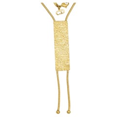Christian Dior, long collier lariat vintage des années 1990 avec logo et monogramme