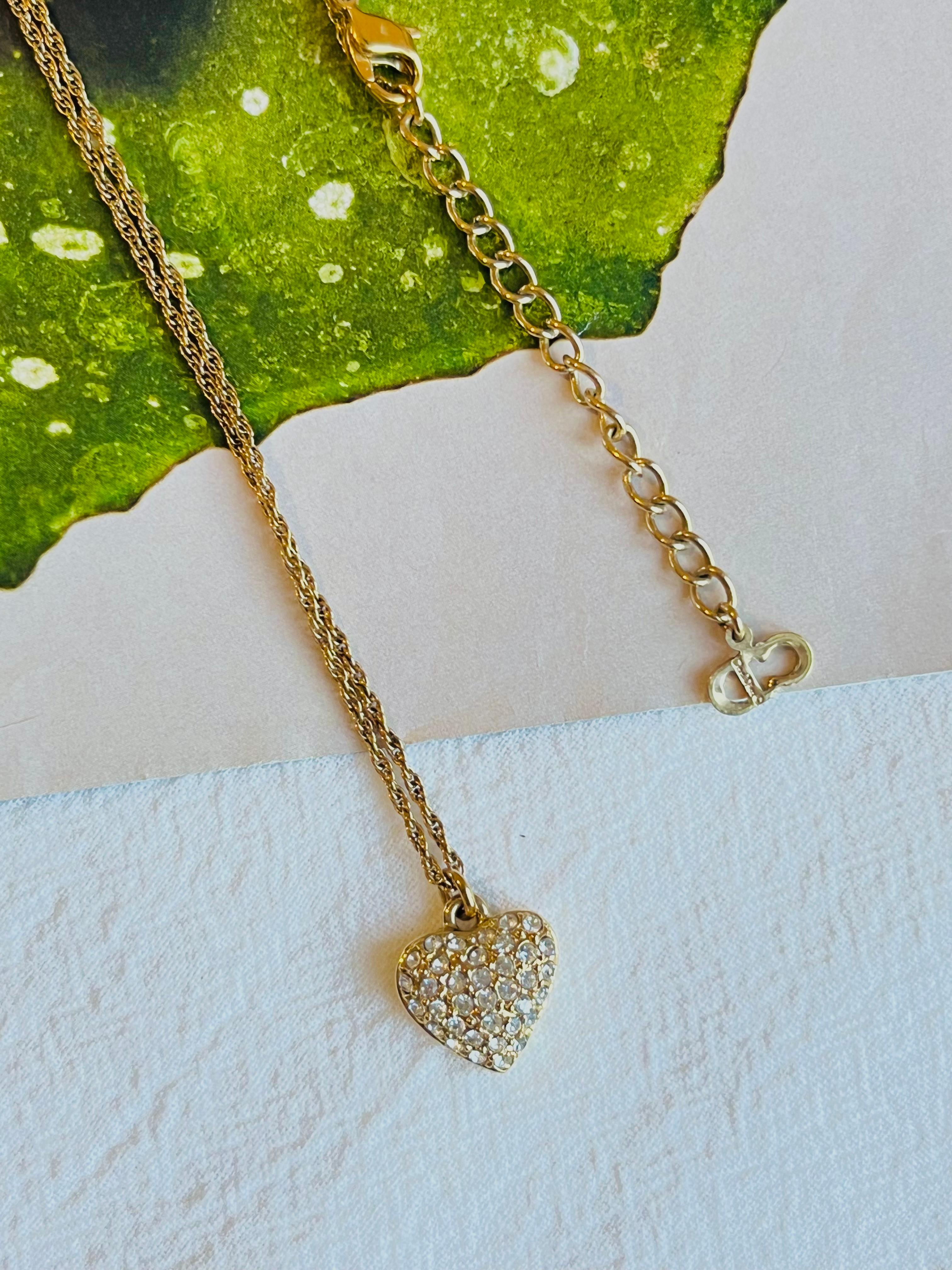 Christian Dior Vintage 1990s Shining Crystals Heart Love Pendant Necklace, Gold Plated

Very good condition. Not any scratches or colour loss, only one connection near the hook is not perfect, barely noticeable.

Marked 'Chr.Dior (C) '. 100%