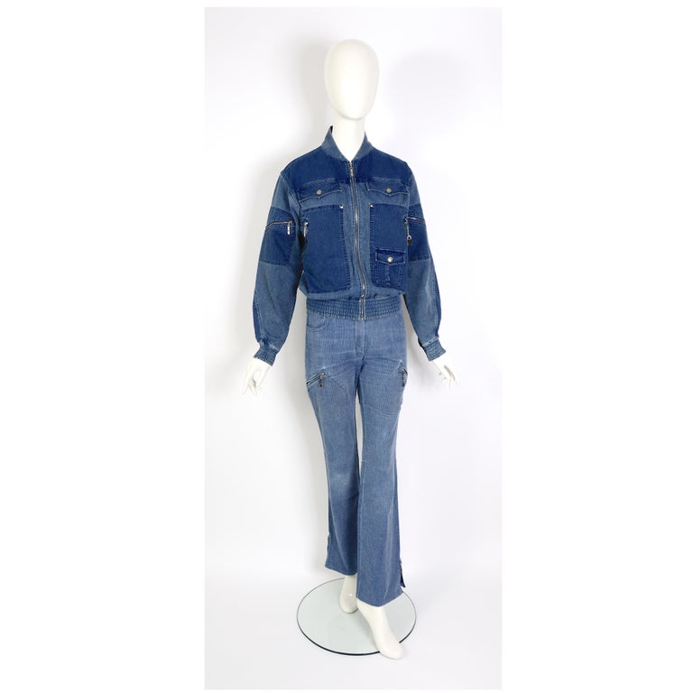Christian Dior by John Galliano vintage 2004 cotton corduroy denim bleu bomber jacket and low waist pants suit.
Jacket size: US 6- French 38
Pants size: US 4 - French 36
Measurements that are taken flat:
Jacket: Ua to Ua 21inch/53cm(x2) - sleeve