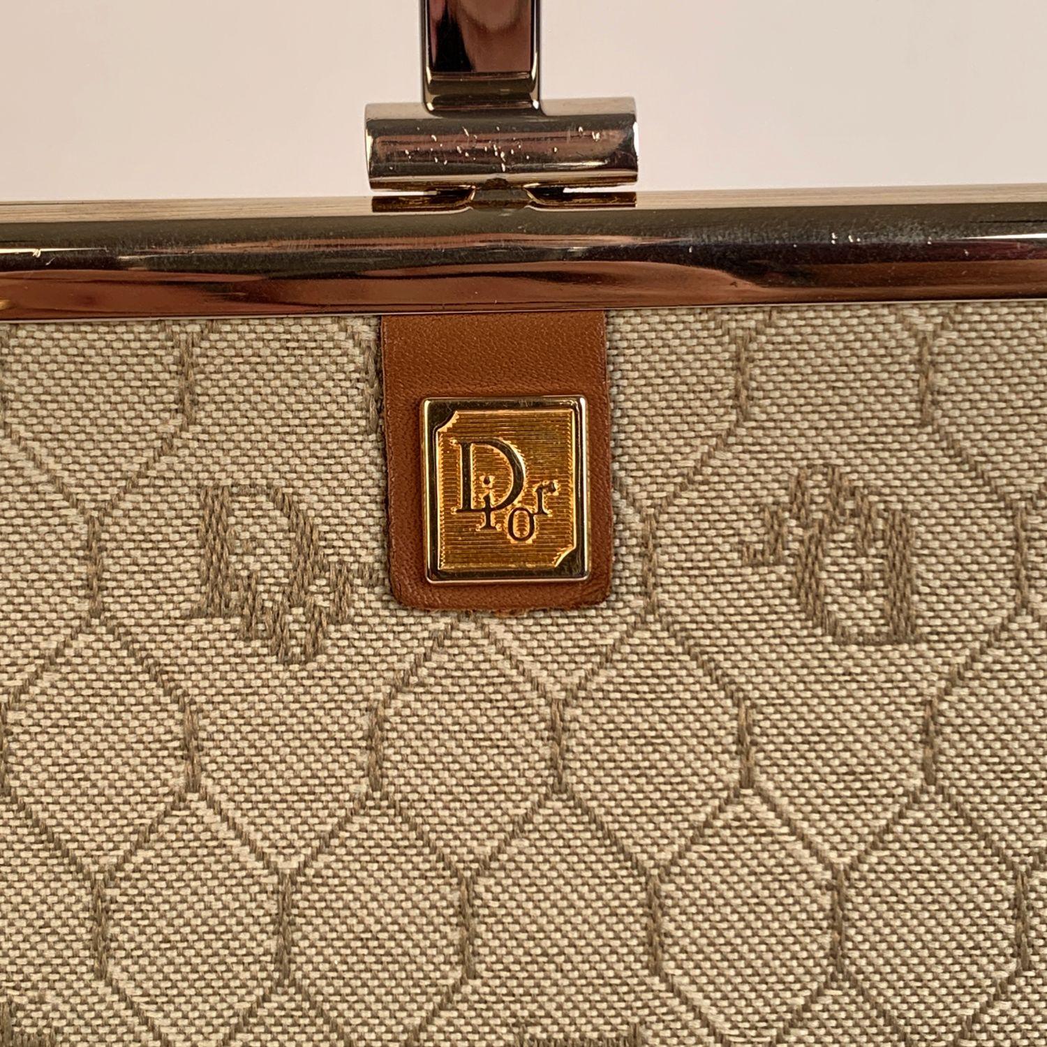 Vintage CHRISTIAN DIOR beige logo canvas with tan leather trim. Clasp closure on top. Beige leather lining. 'Christian Dior - made in France' embossed inside.



Details

MATERIAL: Canvas

COLOR: Beige

MODEL: Clutch Purse

GENDER: Women

SIZE: