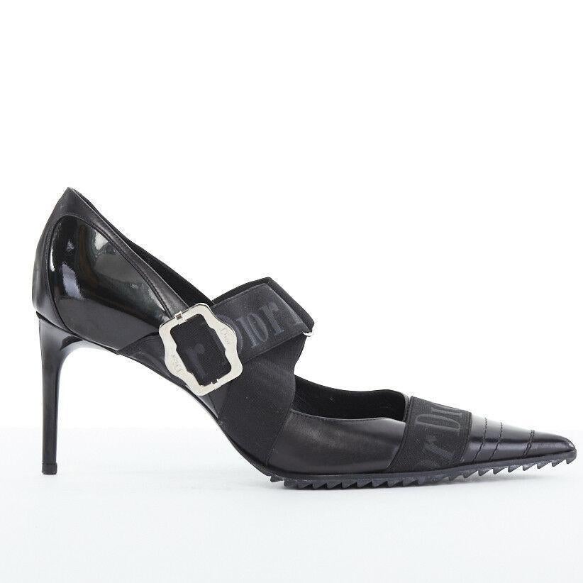 CHRISTIAN DIOR Vintage black logo elasticated strap point toe pumps EU36.5 US6.5
CHRISTIAN DIOR VINTAGE
Black leather upper. Pointed toe. 
Tonal stitching detail at toe. Dior printed elasticated band detail across vamp. 
Cross front logomania