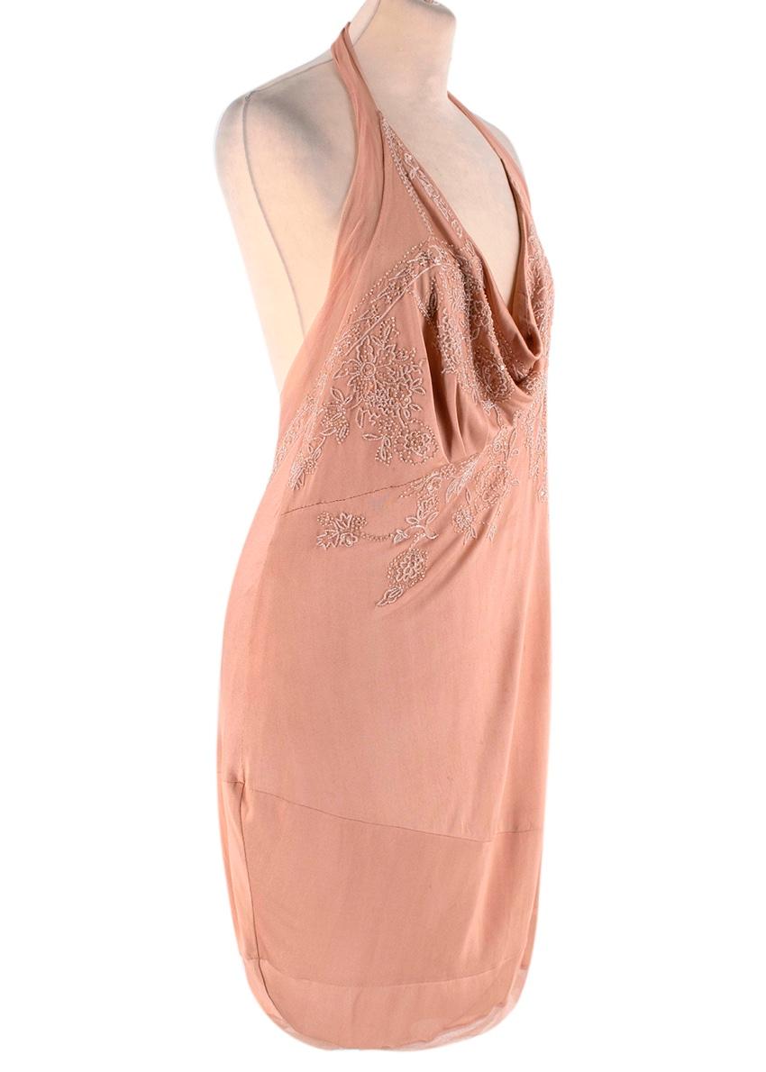 Christian Dior Blush Silk Beaded Mini Dress

-Made of a luxurious silk jersey
-Mesh details to the neckline and hem 
-Gorgeous beaded floral motifs 
-Mini length 
-Neck strap 
-Silk crepe lining 
-Neutral elegant piece 

Materials:
100% silk 

Dry