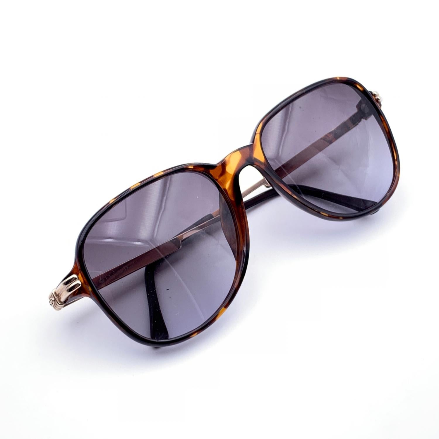 Vintage Christian Dior sunglasses, Mod. 2522 - Col 10.Brown Optyl frame with gold metal ear stems. Rectangular design design. Original 100% Total UVA/UVB protection lenses in gradient grey color. CD logo on temples. Made in