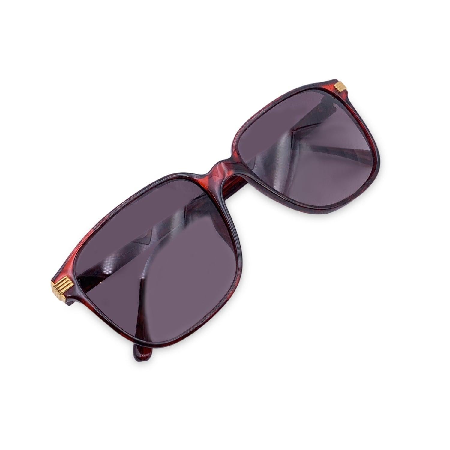 Vintage Christian Dior Women Sunglasses, Mod. 2542 30 Optyl. Size: 54/17 135mm. Red acetate frame, with gold details on frame sides. CD logo con temples . 100% Total UVA/UVB protection. Grey gradient lenses. Condition A+ - MINT Never Worn, no defect