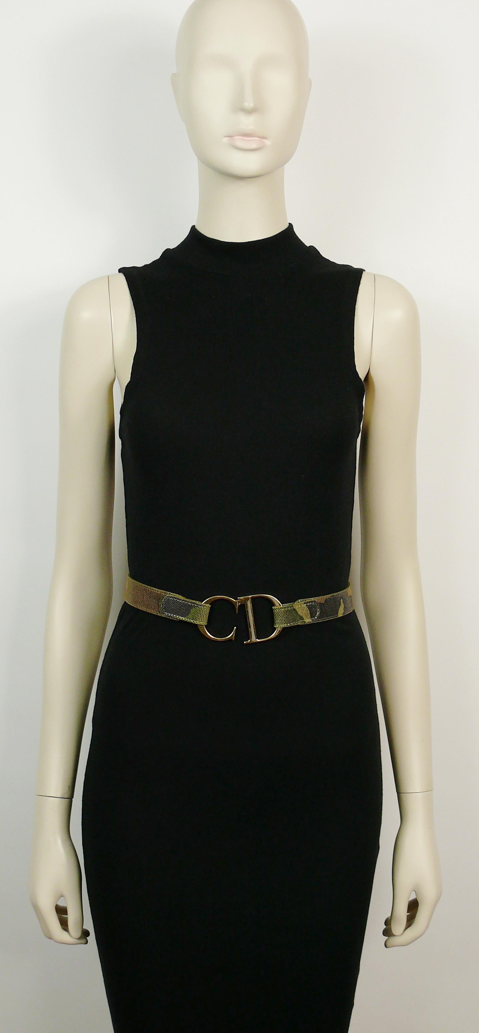 CHRISTIAN DIOR vintage rare camouflage print leather belt featuring a lizard skin pattern and a stunning gold tone articulated CD logo buckle.

Early 2000s.

Velcro strap closure at front.

Embossed CHRISTIAN DIOR on ther reverse of the