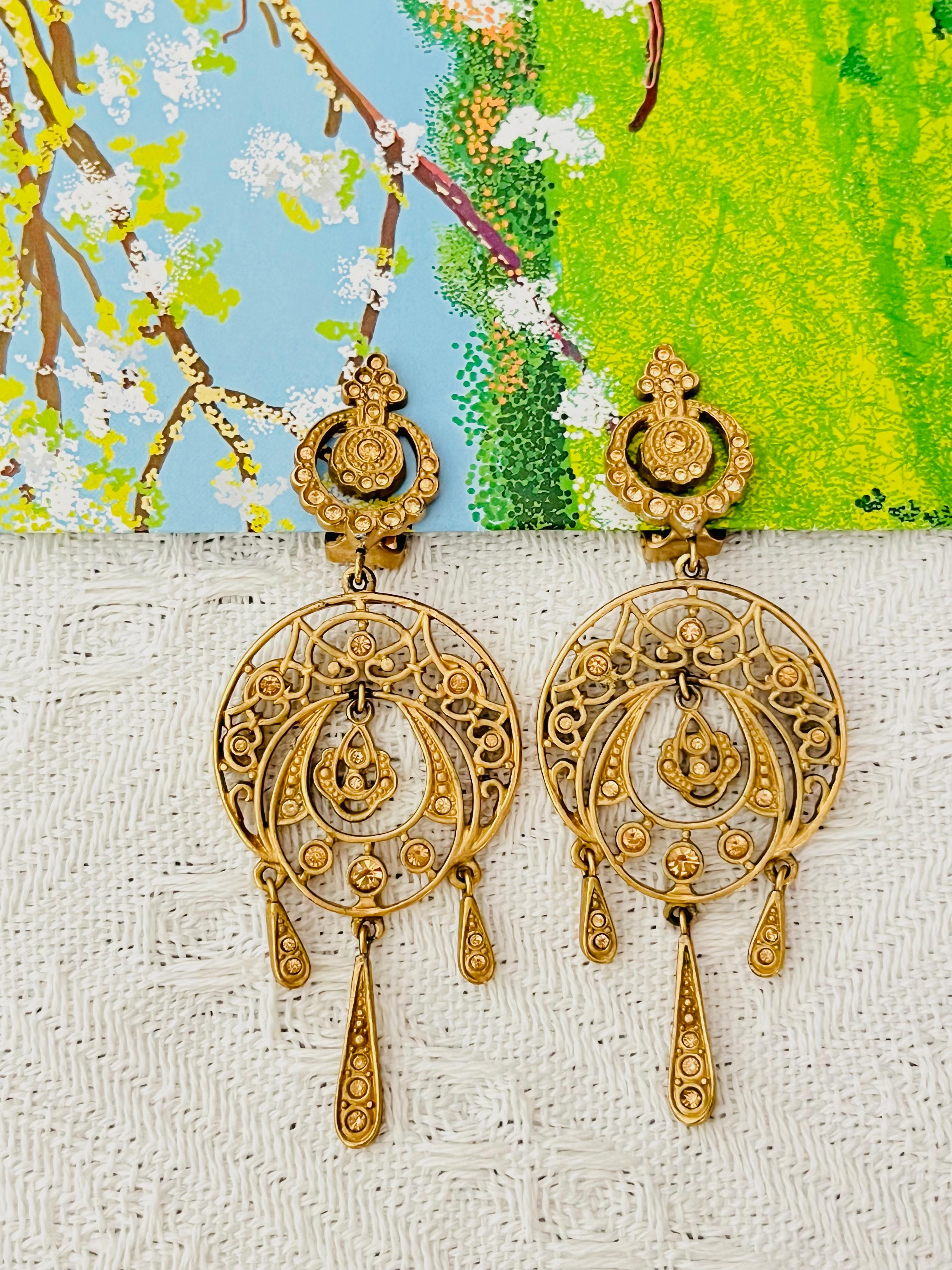 Christian Dior by John Galliano Vintage Baroque Large Citrine Crystals Circle Flower Openwork Chandelier Dangle Water Drop Elegant Chunky Clip Earrings, Gold Plated

Very good condition. Light scratches or colour loss, barely noticeable. 100%