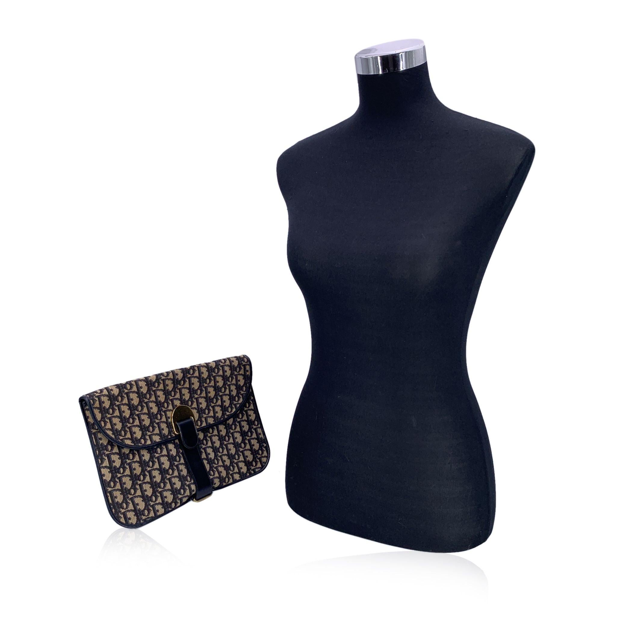 There's a certain understated elegance that only vintage Dior can offer, and this clutch is a beautiful example of that legacy. Crafted in the iconic dark blue Oblique monogram canvas, this vintage Christian Dior clutch is trimmed in smooth blue