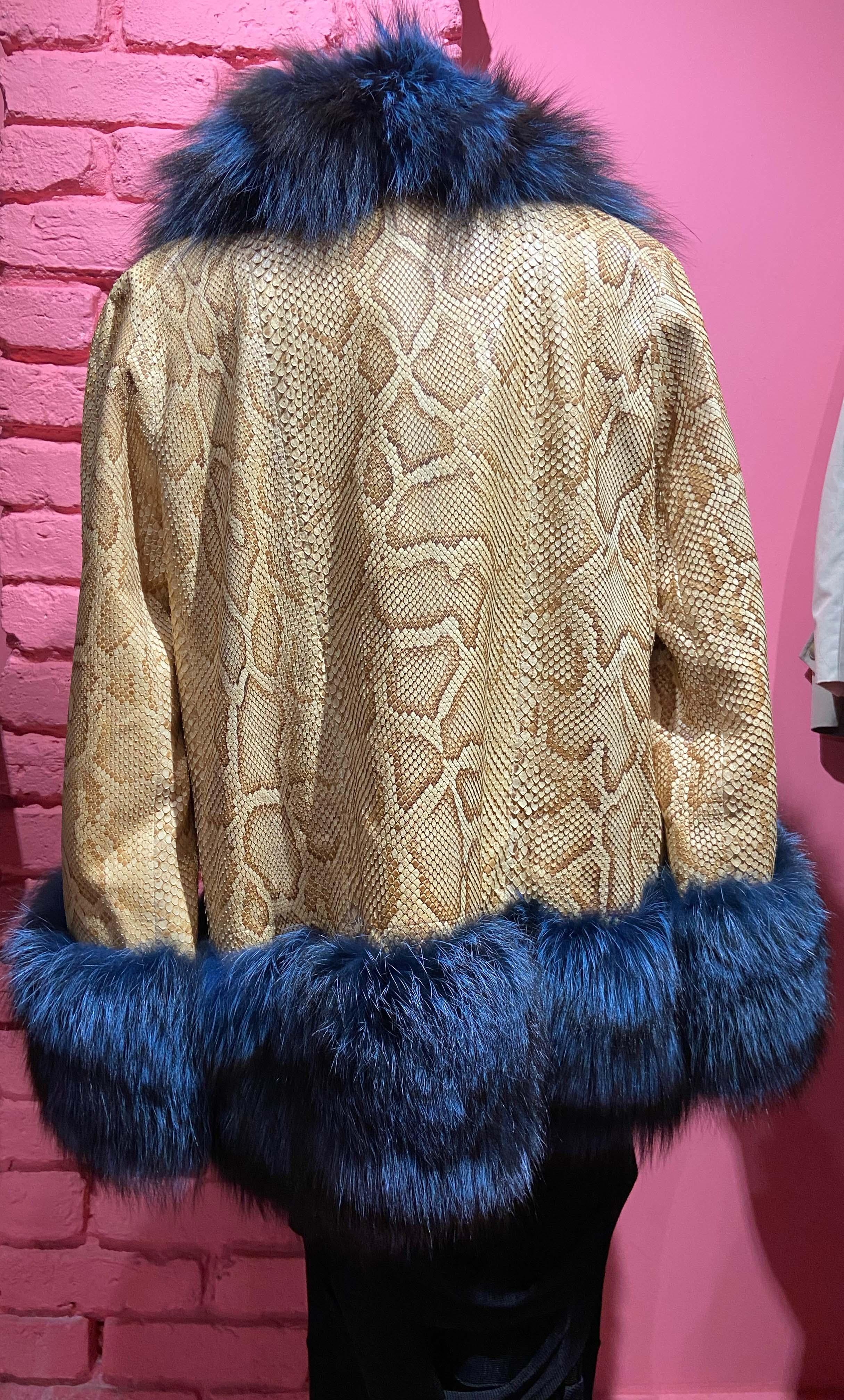 Christian Dior by John Galliano F/W 2010 yellow snakeskin jacket. Features blue dye artic fox fur trim details around the neckline, cuffs and hem. Three front buttons for closure.
 In excellent vintage condition.
Brand:
Christian Dior
Size:
UK