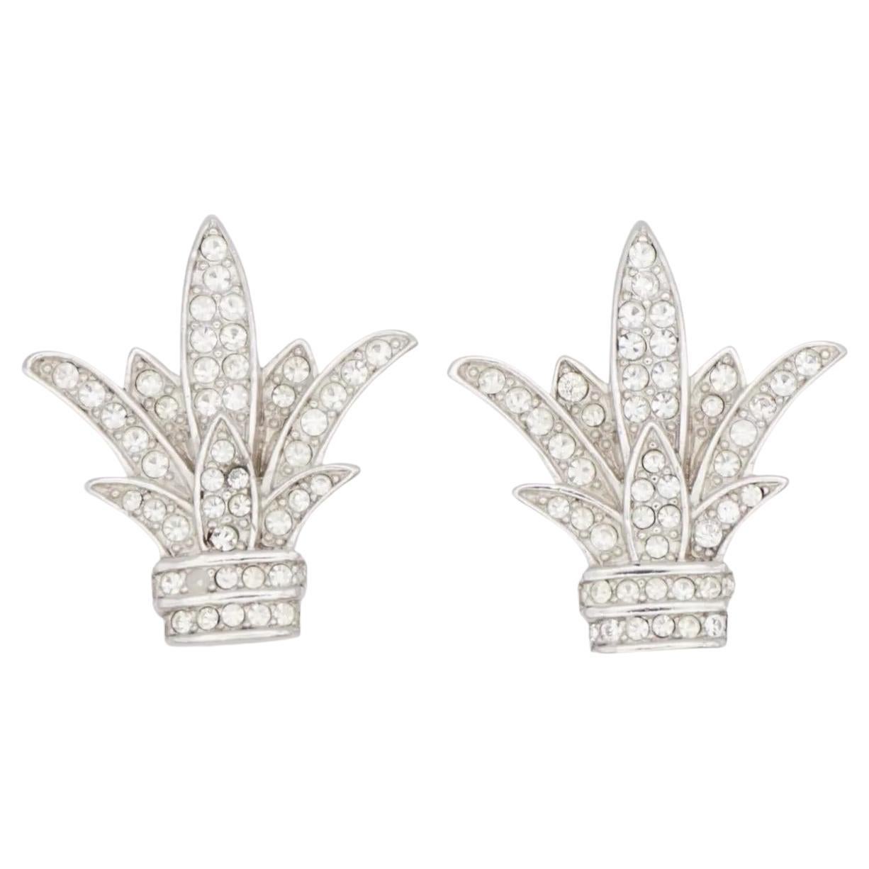 Christian Dior Vintage Fleur De Lis Whole Clear White Crystals Lily Flower Leaf Modenrist Elegant Clip Earrings, Silver Tone

Very excellent condition. 100% genuine. Rare to find.

A very beautiful pair of clip on earrings by Chr. DIOR, signed at