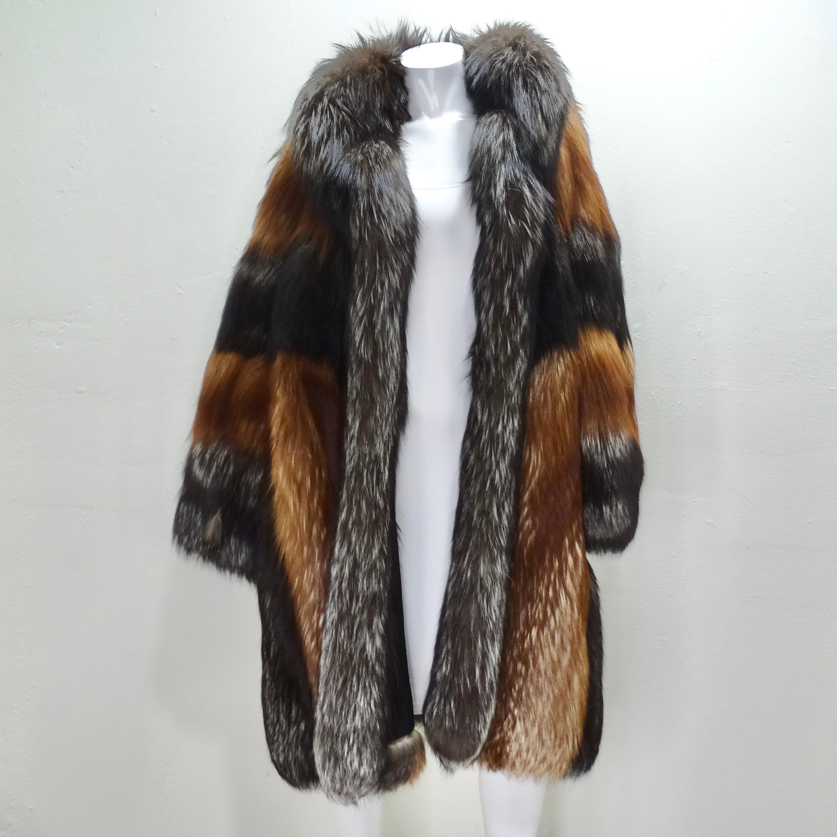 Get your hands on this breath taking 1970s Christian Dior fox fur coat! The most luxurious and dramatic classic fur coat in an eye catching contrasting brown fur. Beautiful stripes of varying shades of brown fox fur come together in a zig zag