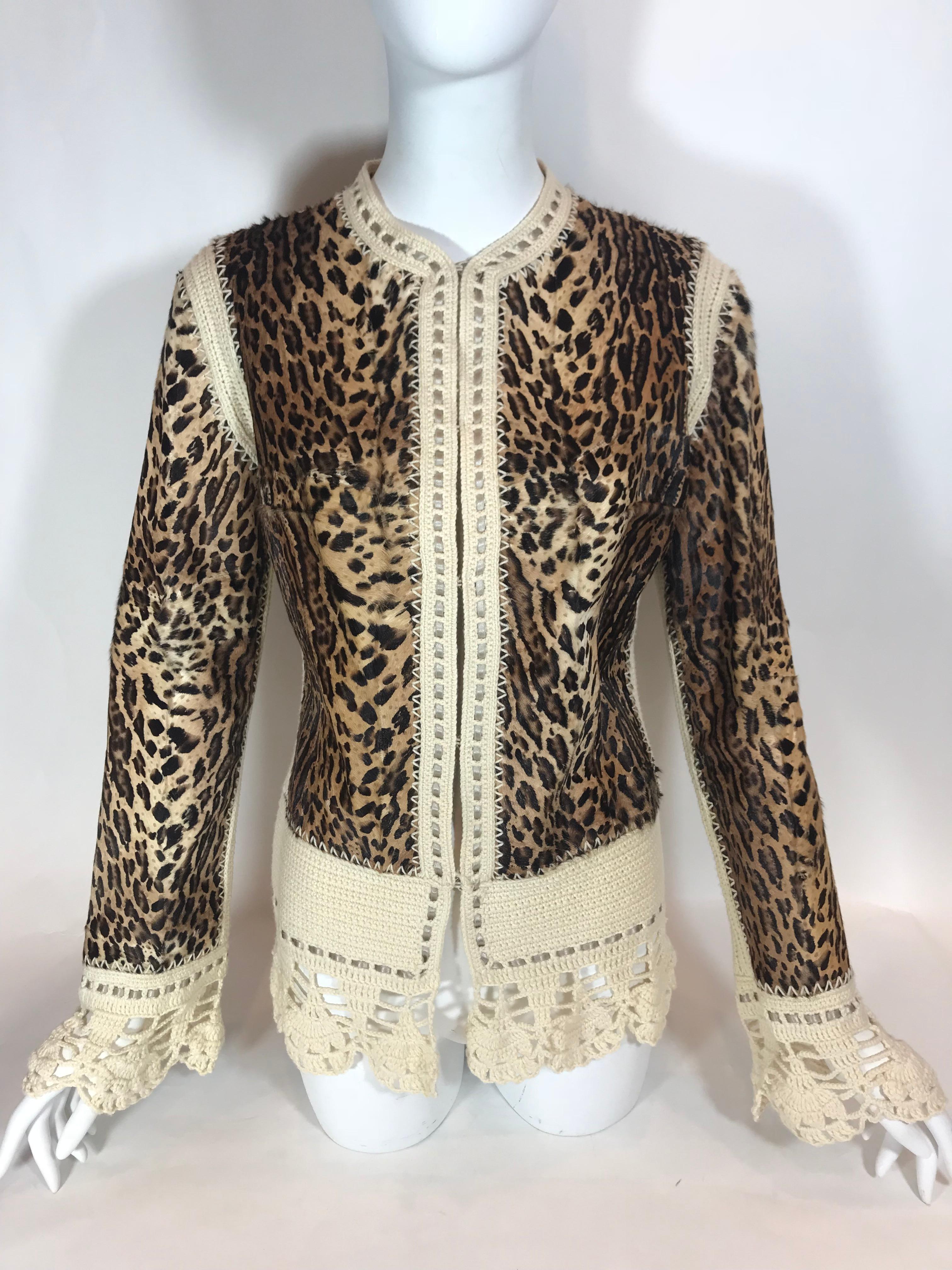 Brown vintage goat hair and wool jacket with leopard print throughout. Crochet trim. Hook-and-eye closures at front.