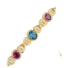 Christian Dior Vintage Gold Blue Amethyst Sapphire Interlocked Oval Brooch