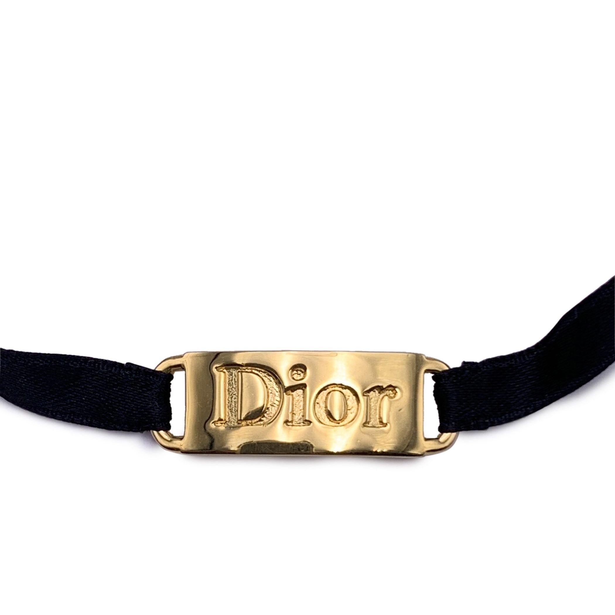 Christian Dior Vintage Gold Metal Black Ribbon Logo Plate Bracelet In Excellent Condition For Sale In Rome, Rome