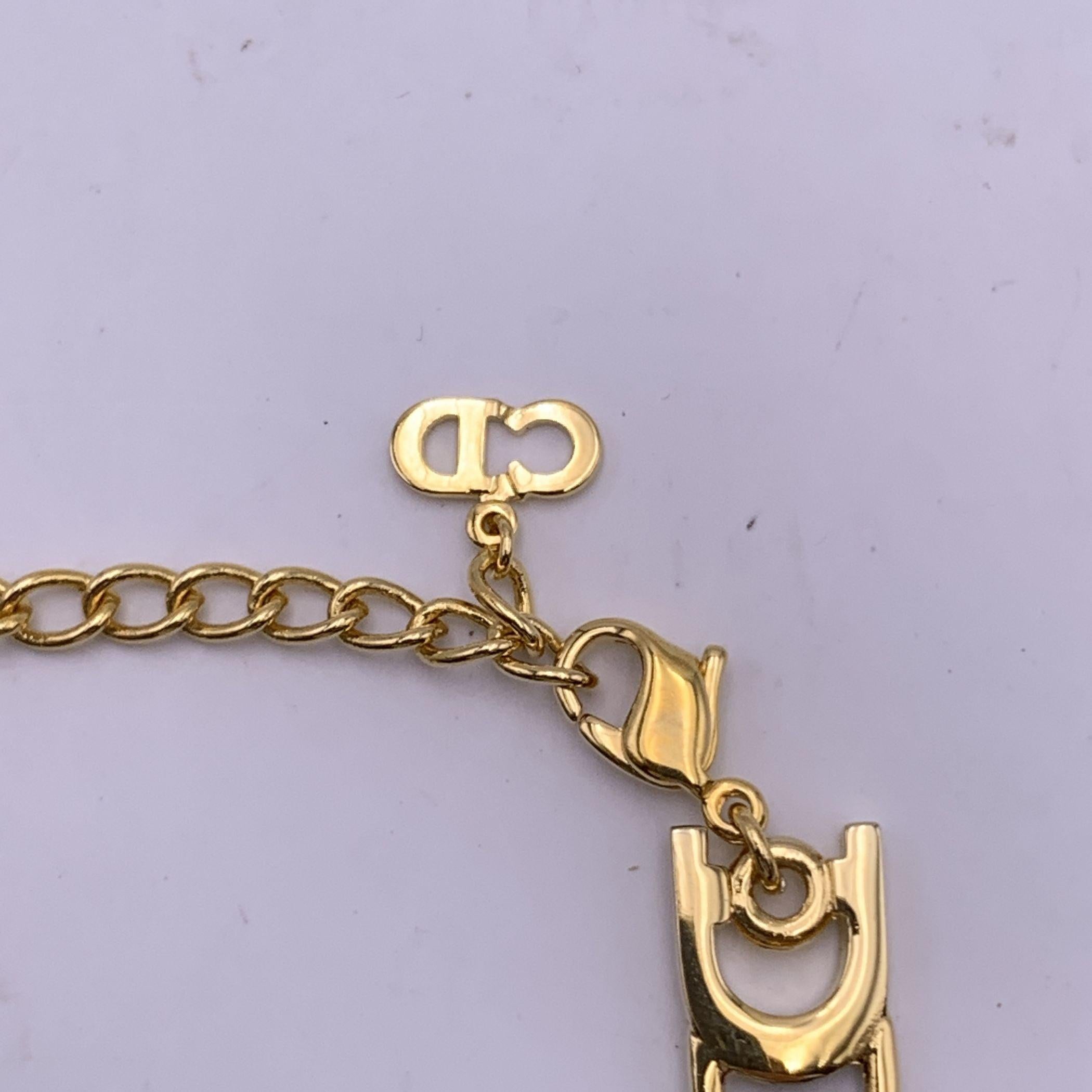 Women's Christian Dior Vintage Gold Metal Black Ribbon Logo Plate Bracelet For Sale