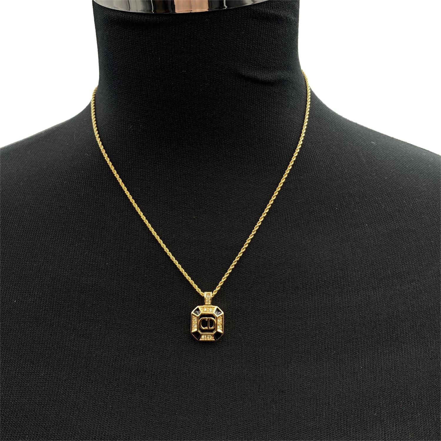 Vintage Christian Dior gold metal chain necklace with CD square logo pendant, embellished with small rhinestones and black enamel. Spring ring closure. SChain length: about 16.5 inches - 42 cm Condition A - EXCELLENT Gently used. Please, look