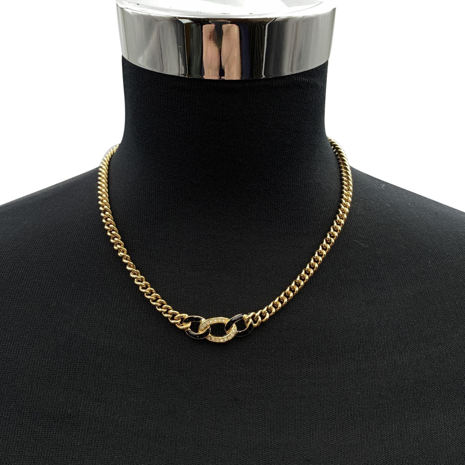 Christian Dior gold metal necklace with black enameled and crystals Interlock chain links. Marked 'Chr.Dior'. on the closure Max chain length: about 17 inches - 43.2 cm. Condition A - EXCELLENT Gently used. Please, look carefully at the photos and