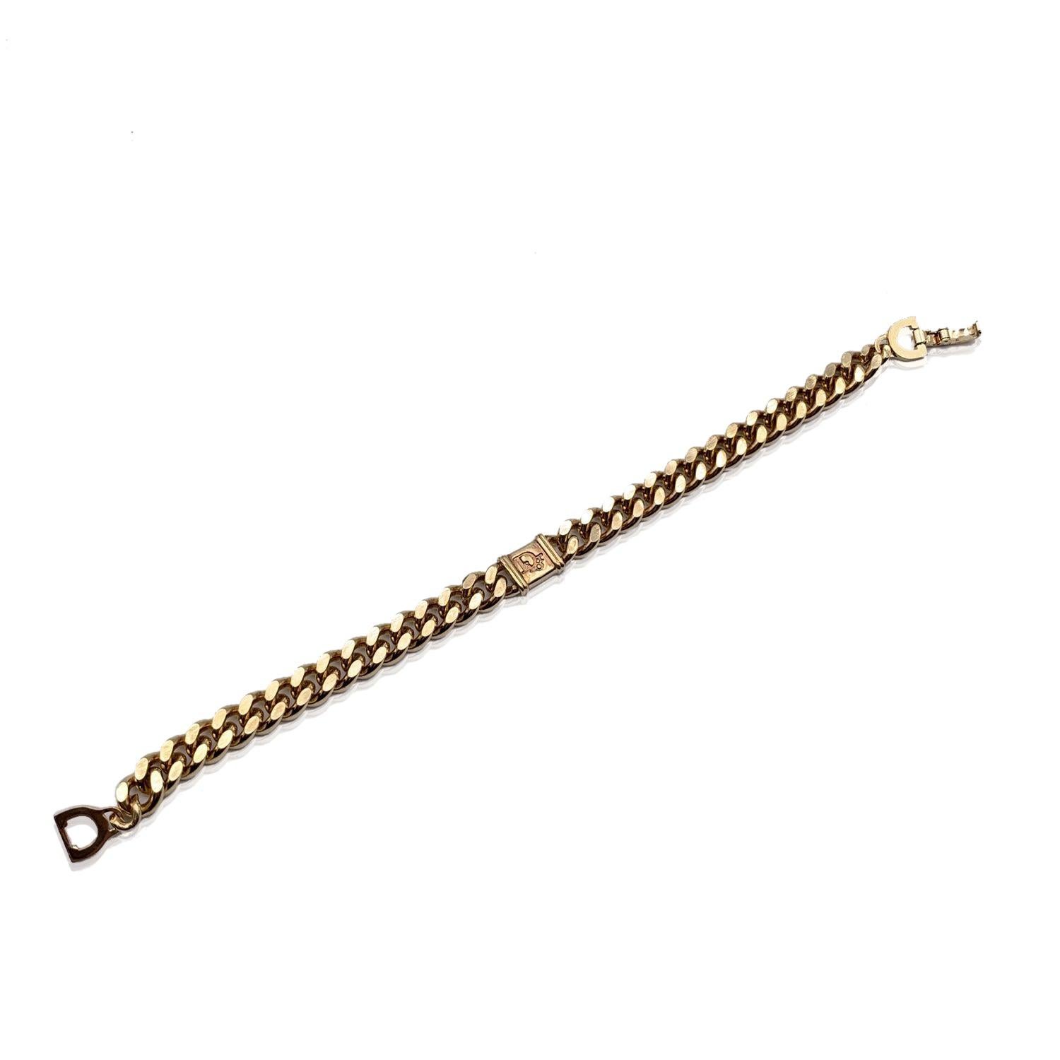 Vintage gold metal chain bracelet by CHRISTIAN DIOR. Dior logo center piece in the center. Clasp closure. Total length: 7 inches - 17.8 cm. 'Chr. Dior' engraved on the closure. Made in Germany Condition A - EXCELLENT Gently used. Please check