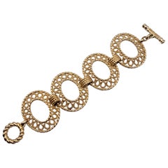 Christian Dior Bracciale ovale in metallo dorato vintage con anello