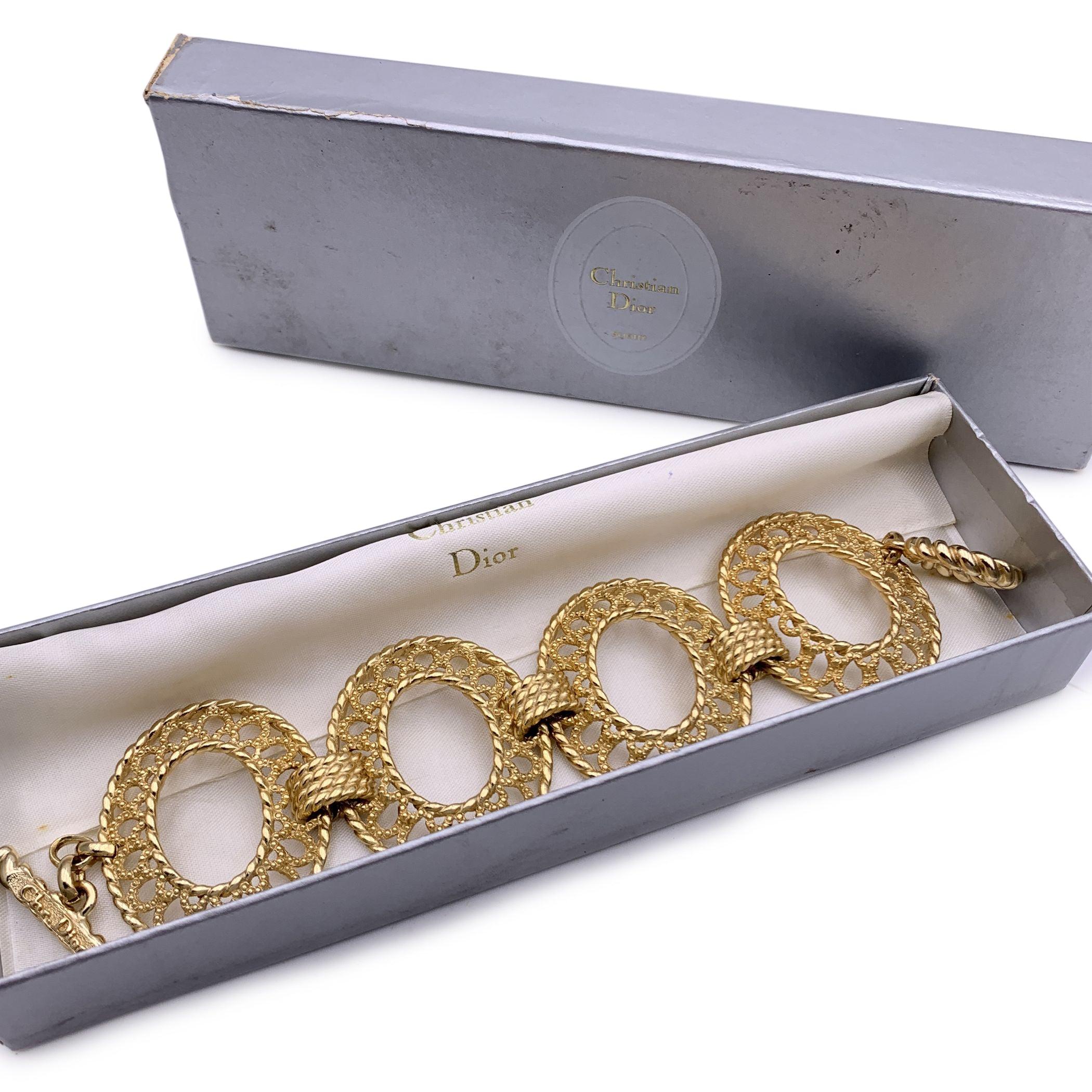 Vintage gold metal chain bracelet by CHRISTIAN DIOR from the 90s. Oval ring design, articulated links and toggle closure. Total length: 8 inches - 20.3 cm. 'Chr. Dior' engraved on the closure. Made in Germany Condition A - EXCELLENT Gently used.