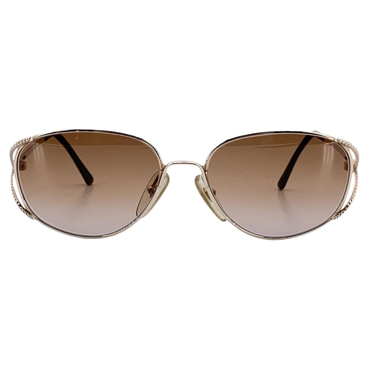 Occhiali da sole ovali vintage in metallo dorato Christian Dior 2712
