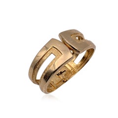 Christian Dior Vintage Gold Metal Rigid Clamper Bracelet Cuff