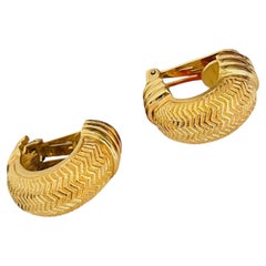 Grandes boucles d'oreilles vintage Christian Dior en or texturé, en forme de cercle bombé et massives