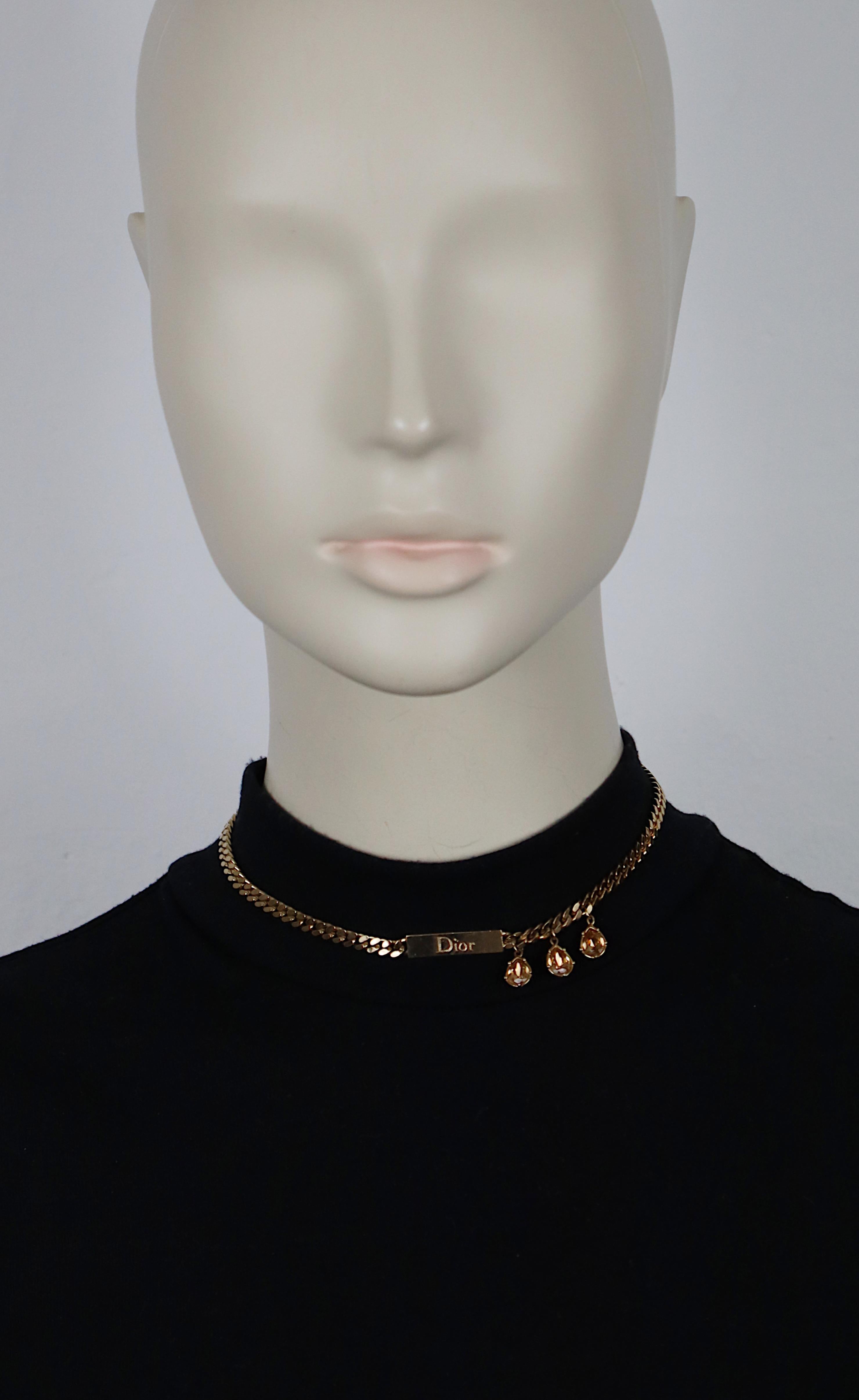 CHRISTIAN DIOR vintage light gold tone curb chain necklace featuring an ID tag embossed DIOR an three topaz color crystal drops.

Lobster clasp closure.

Embossed DIOR.

Indicative measurements : wearable length from approx. 32 cm (12.60 inches) to