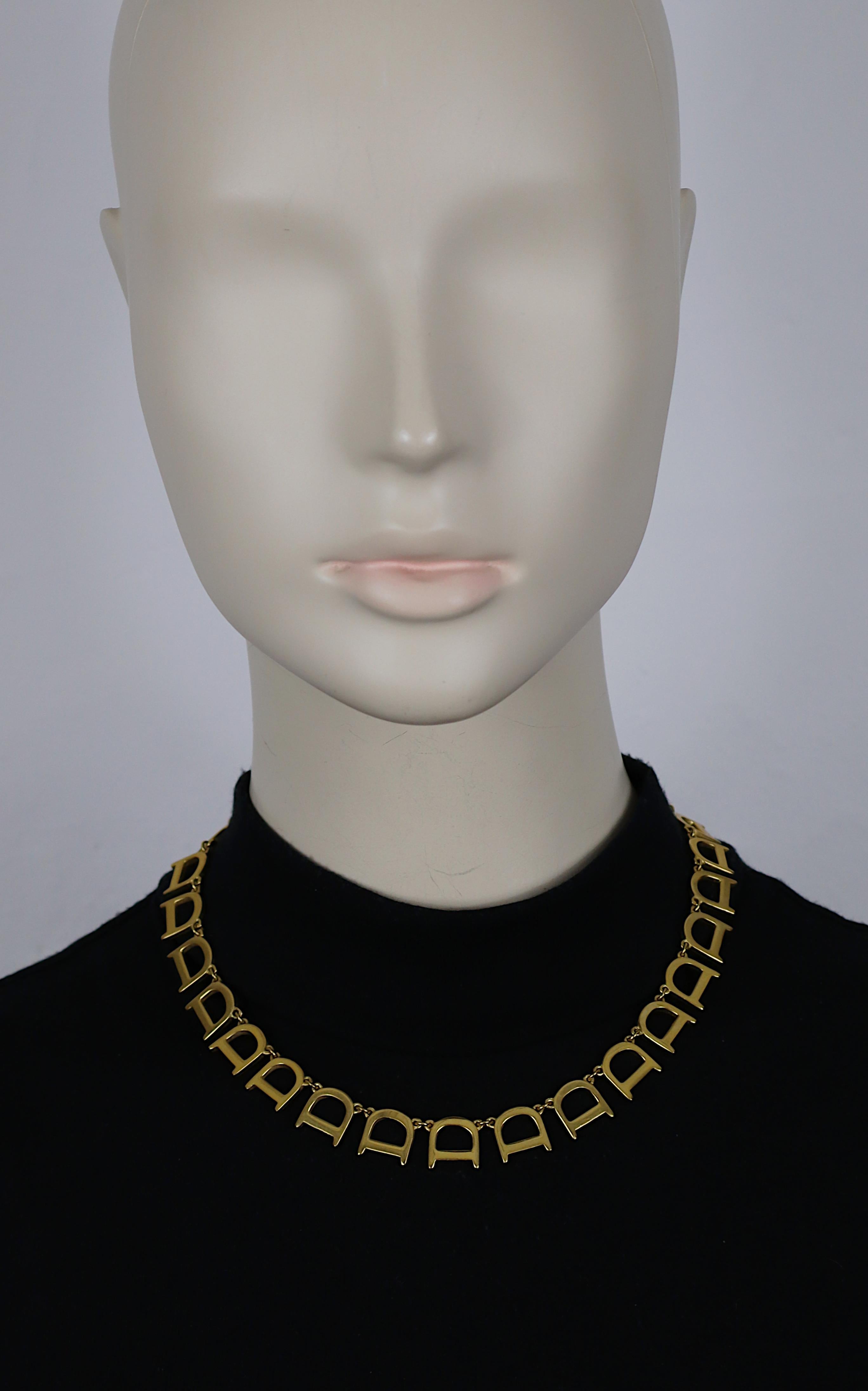 CHRISTIAN DIOR vintage gold tone necklace and bracelet set featuring D initial links.

Lobster clasp closure.

Embossed DIOR on the CD hanging metal tag (only on the necklace / the extension chain with the CD hanging metal tag was removed from the