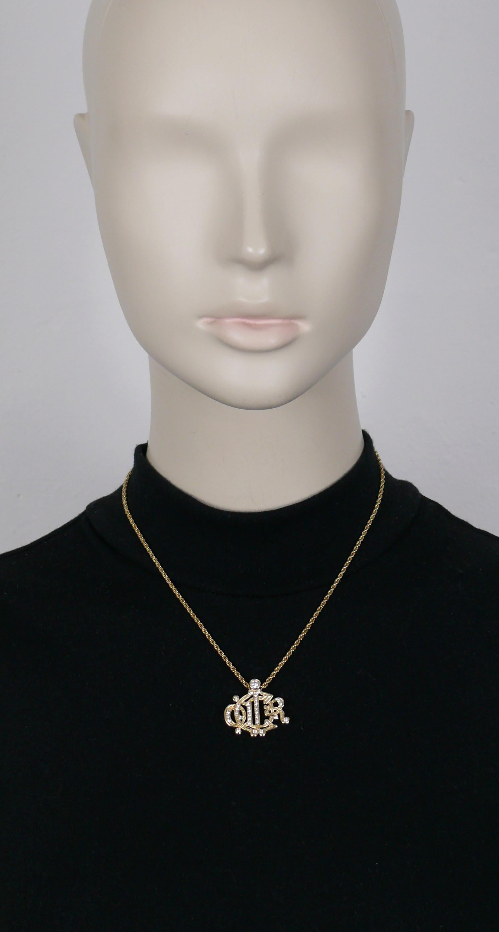CHRISTIAN DIOR vintage gold tone chain necklace featuring a C DIOR logo pendant embellished with clear crystals.

Adjustable lobster clasp closure.

Embossed CHR. DIOR © GERMANY.

Indicative measurements : chain length from approx. 39.5 cm (15.55