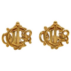 Orecchini a clip con logo CHRISTIAN DIOR Vintage in tonalità oro