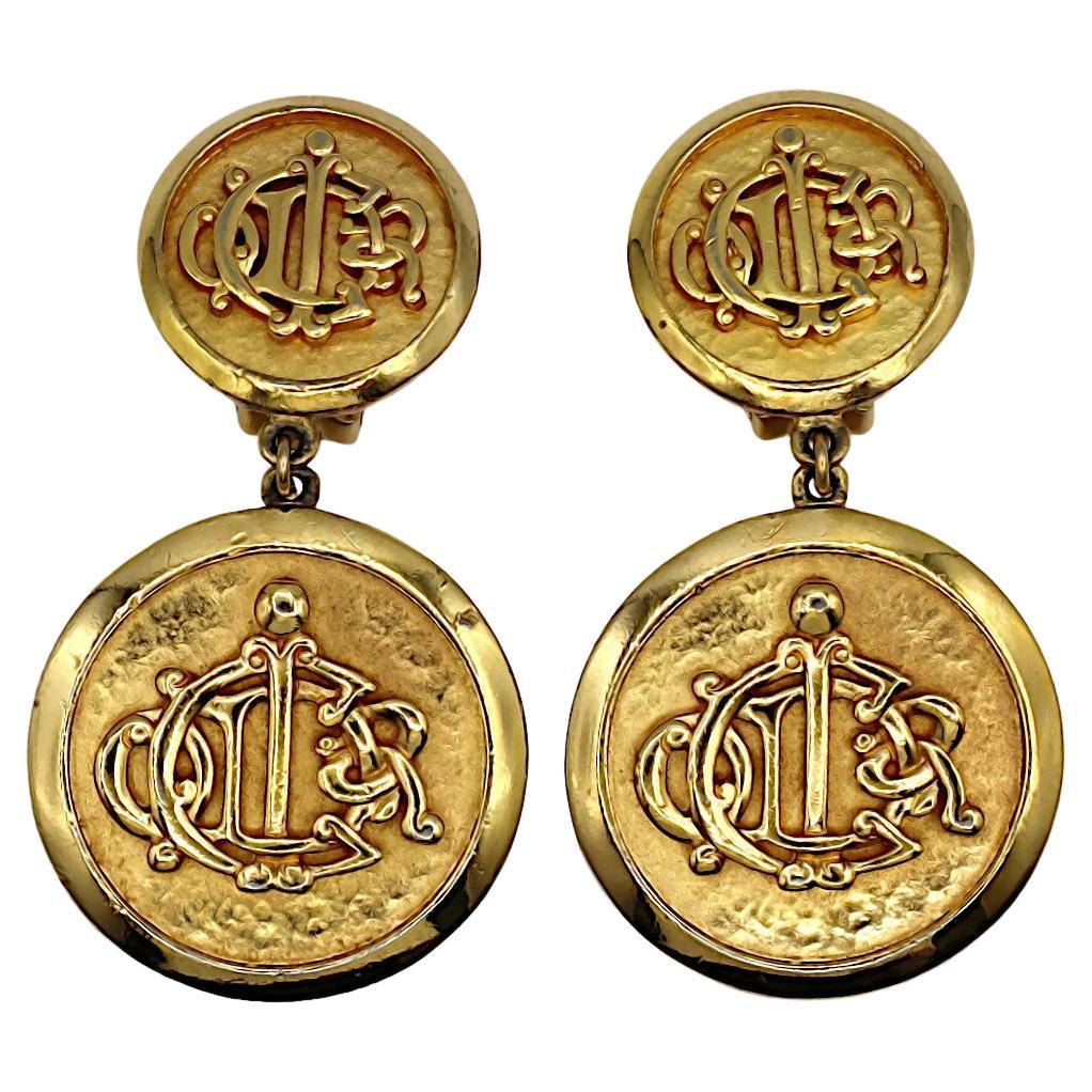 CHRISTIAN DIOR Vintage Gold Tone Logo Dangling Earrings