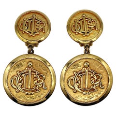 CHRISTIAN DIOR Vintage Gold Tone Logo Dangling Earrings