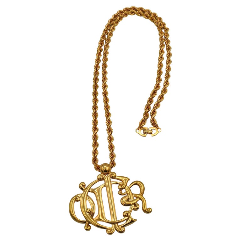 CHRISTIAN DIOR Vintage Gold Tone Logo Pendant Necklace For Sale at 1stDibs