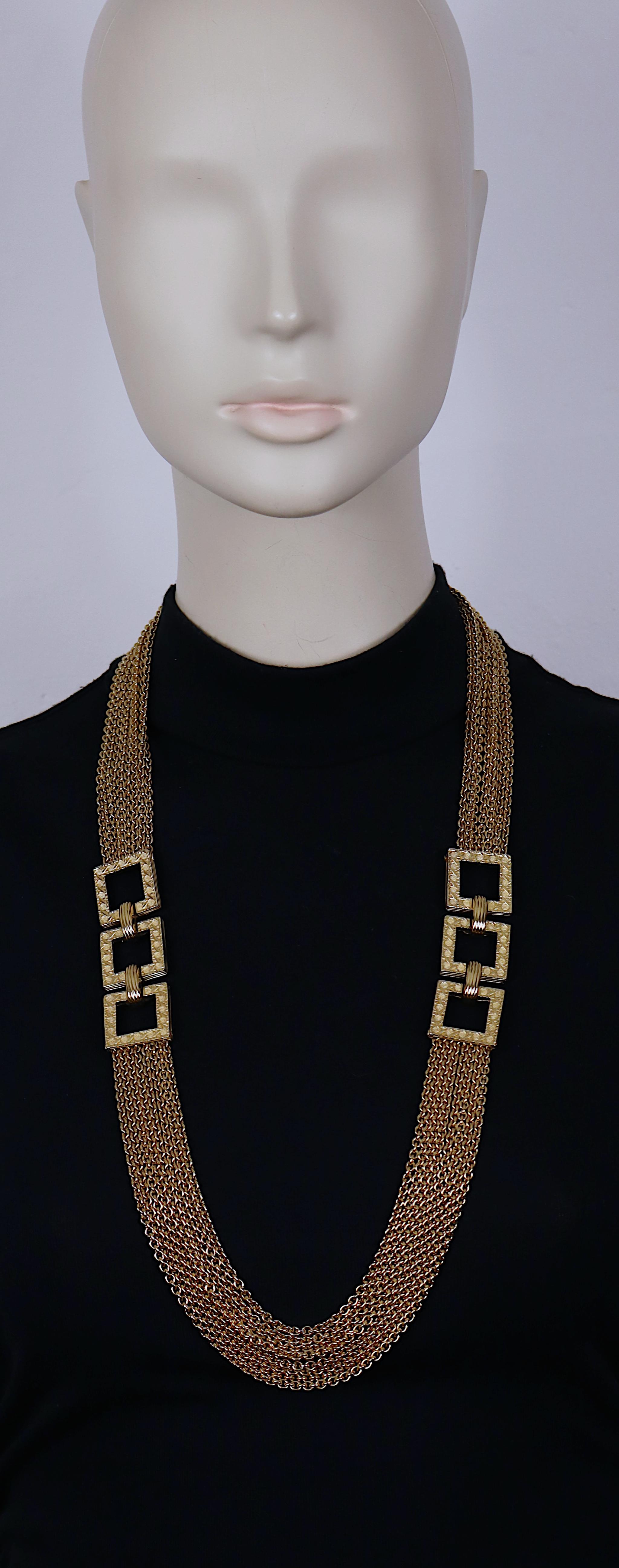 CHRISTIAN DIOR vintage gold tone multi chain necklace featuring iconic cannage design square links.

Fold-over clasp.

Embossed DIOR.

Indicative measurements : length approx. 77 cm (30.31 inches) / square link approx. 2.3 cm x 2.3 cm (0.91 inch x