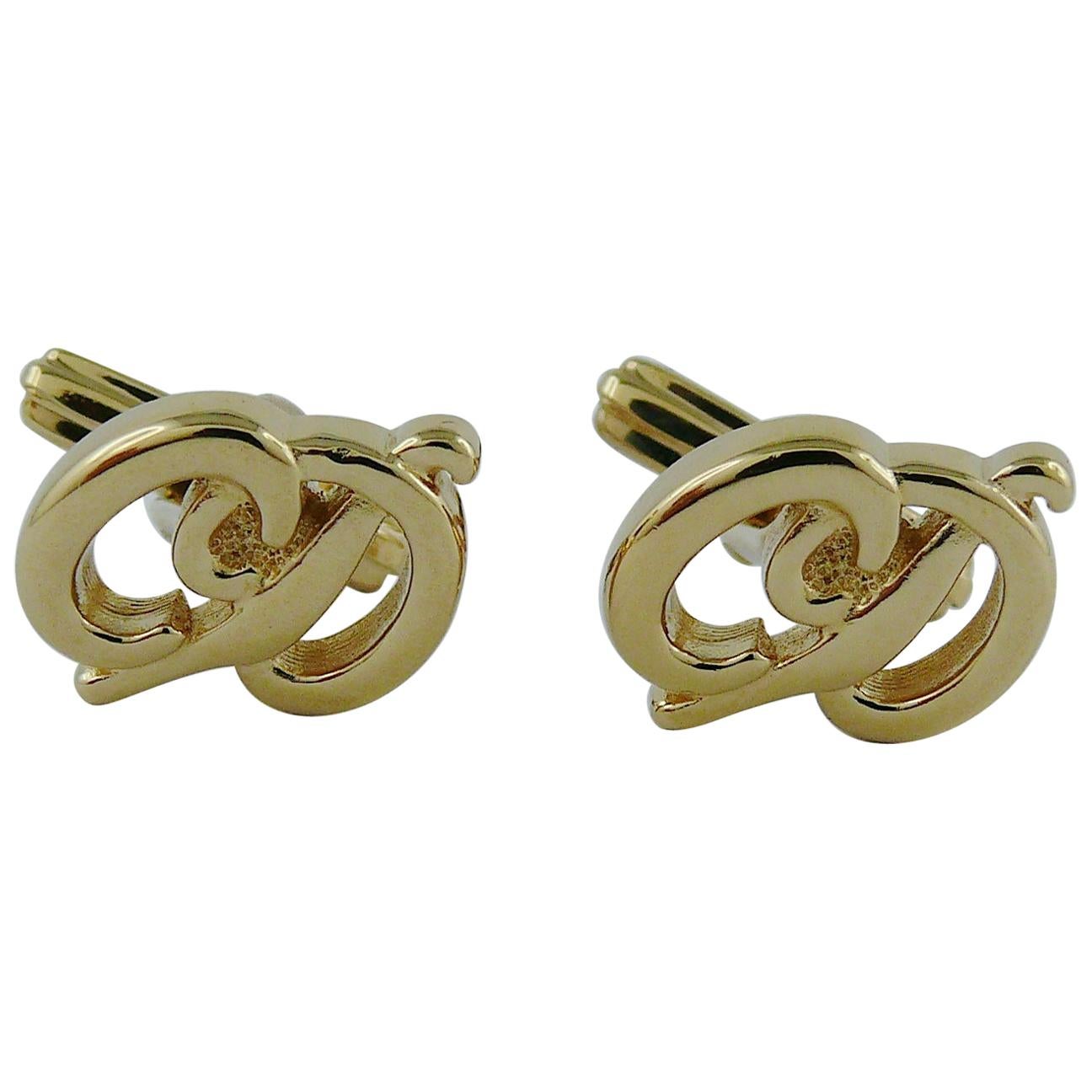 Vintage Christian Dior Banned Cufflinks in gold and zirconia 