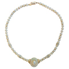 Collier Christian Dior vintage en or, avec perles blanches, perles de nacre, cristaux ronds et ovales
