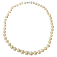 Collana elegante Christian Dior Vintage con perline sferiche di dimensioni variabili e perle bianche