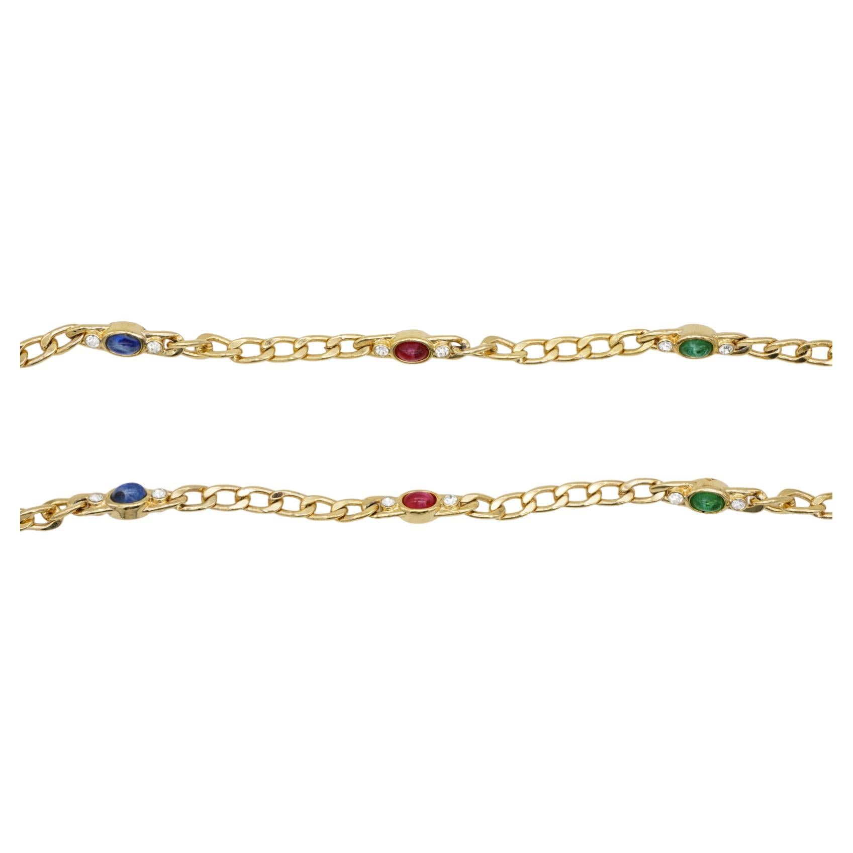 Christian Dior Vintage 1980s Gripoix Sapphire Ruby Emerald Navy Blue Green Red Cabochon Crystals Double Side Multi Strands Layers Figaro Chain Long Necklace, Gold Tone

A versatile necklace. It also can be worn as bracelet or add a pendant on the
