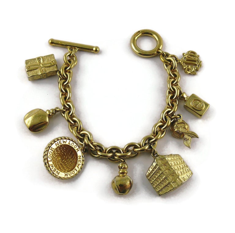 Christian Dior Vintage Iconic Gold Toned Charms Bracelet For Sale