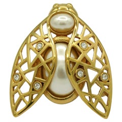 CHRISTIAN DIOR Broche vintage iconique en forme d'abeille ornée de bijoux